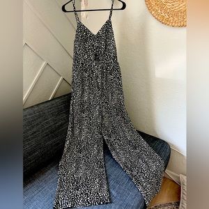 V-neck cutout black and ivory dotted wide leg jumpsuit, size medium